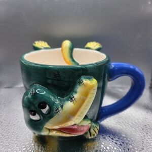DaVinci Green Aligator Mug with Blue Handle